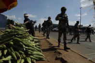 Soldiers patrol the streets of Soweto, South Africa, Thursday, April 23, 2020 as the country remains in lockdown for a fourth week in a bid to combat the spread of the coronavirus. Africa has registered a 43% jump in reported COVID-19 cases in the last week, highlighting a warning from the World Health Organization that the continent of 1.3 billion could become the next epicenter of the global outbreak. (AP Photo/Themba Hadebe)