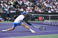 Jannik Sinner, of Italy, returns to Jiri Lehecka, of the Czech Republic, during a quarterfinal match at the BNP Paribas Open tennis tournament, Thursday, March 14, 2024, in Indian Wells, Calif. (AP Photo/Mark J. Terrill)