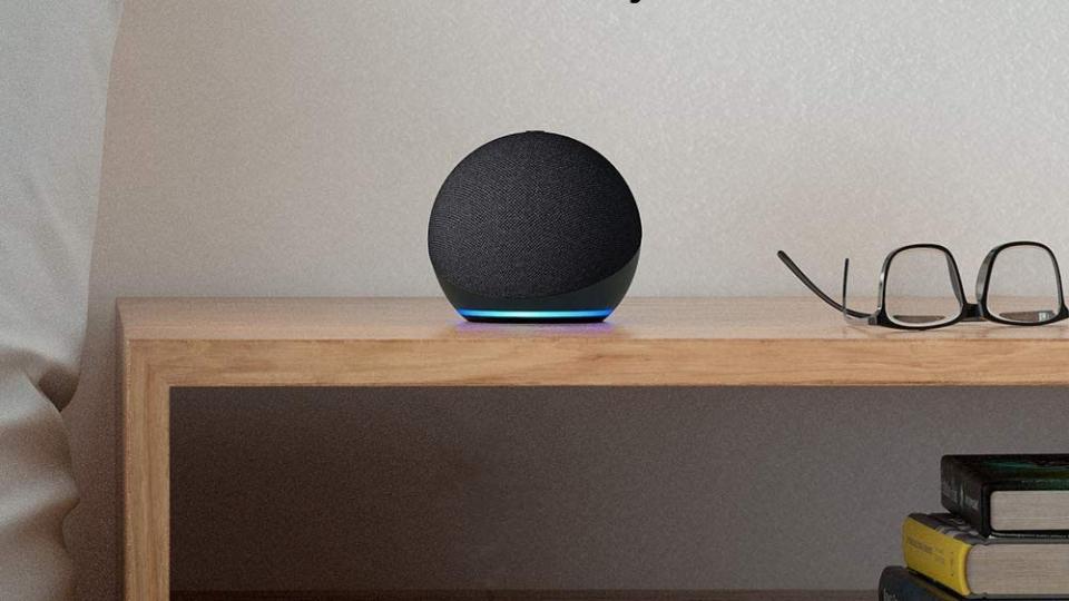 Amazon’s 4th-generation Echo Dot smart speaker set up on a table. - Credit: Amazon
