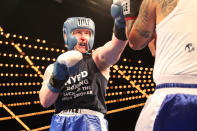 <p>New York’s Finest Matt Rooney throws a jab at Jonathan Alvarez at the NYPD Boxing Championships at the Theater at Madison Square Garden on June 8, 2017. (Photo: Gordon Donovan/Yahoo News) </p>