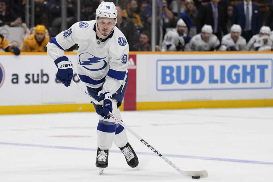 FILE - Tampa Bay Lightning defenseman Mikhail Sergachev (98) plays during the third period of an NHL hockey game against the Nashville Predators, Thursday, Dec. 7, 2023 in Nashville, Tenn. The Utah Hockey Club made a big splash at its first draft, acquiring Mikhail Sergachev from the Tampa Bay Lightning. (AP Photo/George Walker IV, File)