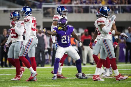 Oct 3, 2016; Minneapolis, MN, USA; Minnesota Vikings running back Jerick McKinnon (21) celebrates a first down during the second quarter against the New York Giants at U.S. Bank Stadium. Mandatory Credit: Brace Hemmelgarn-USA TODAY Sports