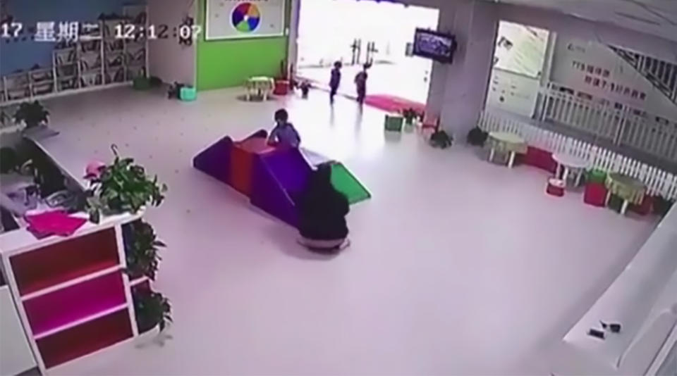 This is the moment two adventurous nursery school boys “break out” of their classroom. (Asirewire)