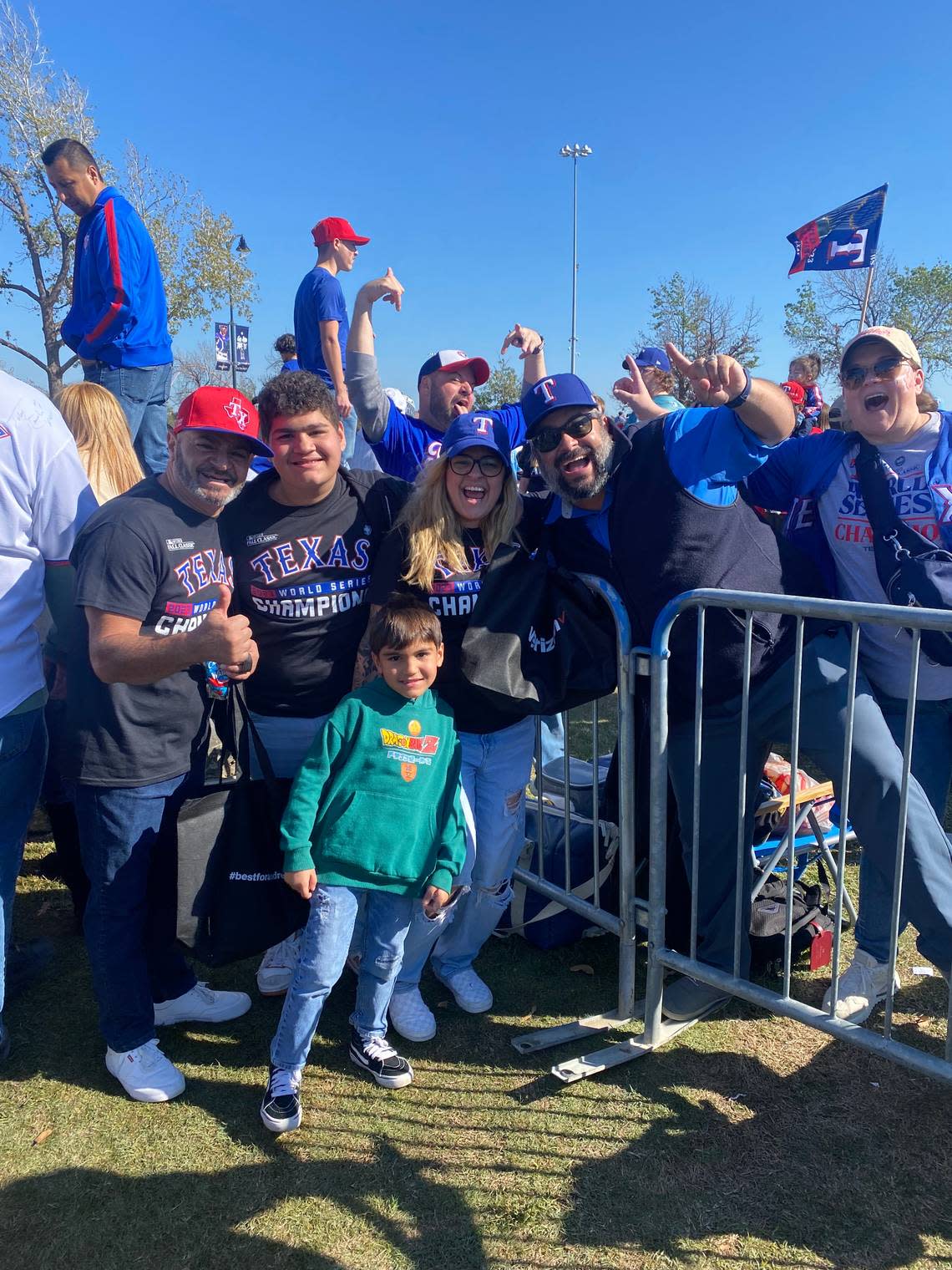 Life-long Rangers fan Kamal Heikal, second from the right, poses with fellow fans. Jenny Rudolph