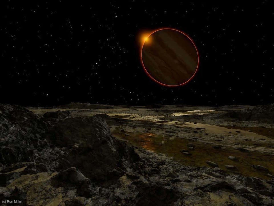 The sun as seen from Europa, one of Jupiter's moons. Jupiter is about 484 million miles from the sun, or about 5.2 times farther than the distance from Earth to the sun. Here we see&nbsp;Jupiter about to eclipse a sun five times smaller than the one we see from Earth. Sunlight passing through the planet&rsquo;s dense atmosphere illuminates it in a ring of red light.