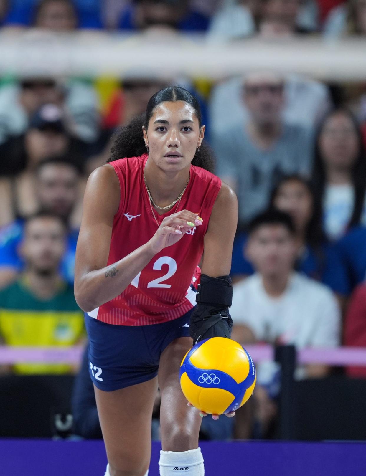 Aug 11, 2024; Paris, France; United States opposite Jordan Thompson (12) in action against Italy in the women's volleyball gold medal match during the Paris 2024 Olympic Summer Games at South Paris Arena.