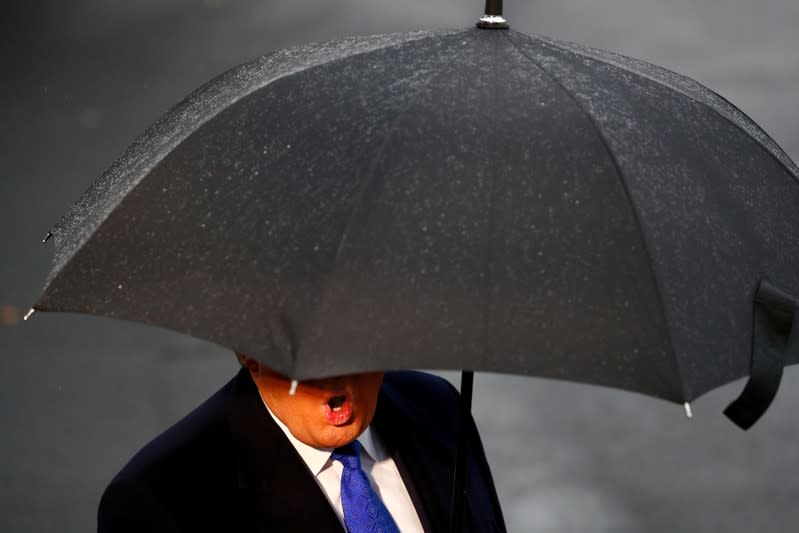 FILE PHOTO: U.S. President Donald Trump delivers remarks to the press before boarding Marine One at the South Lawn of the White House in Washington