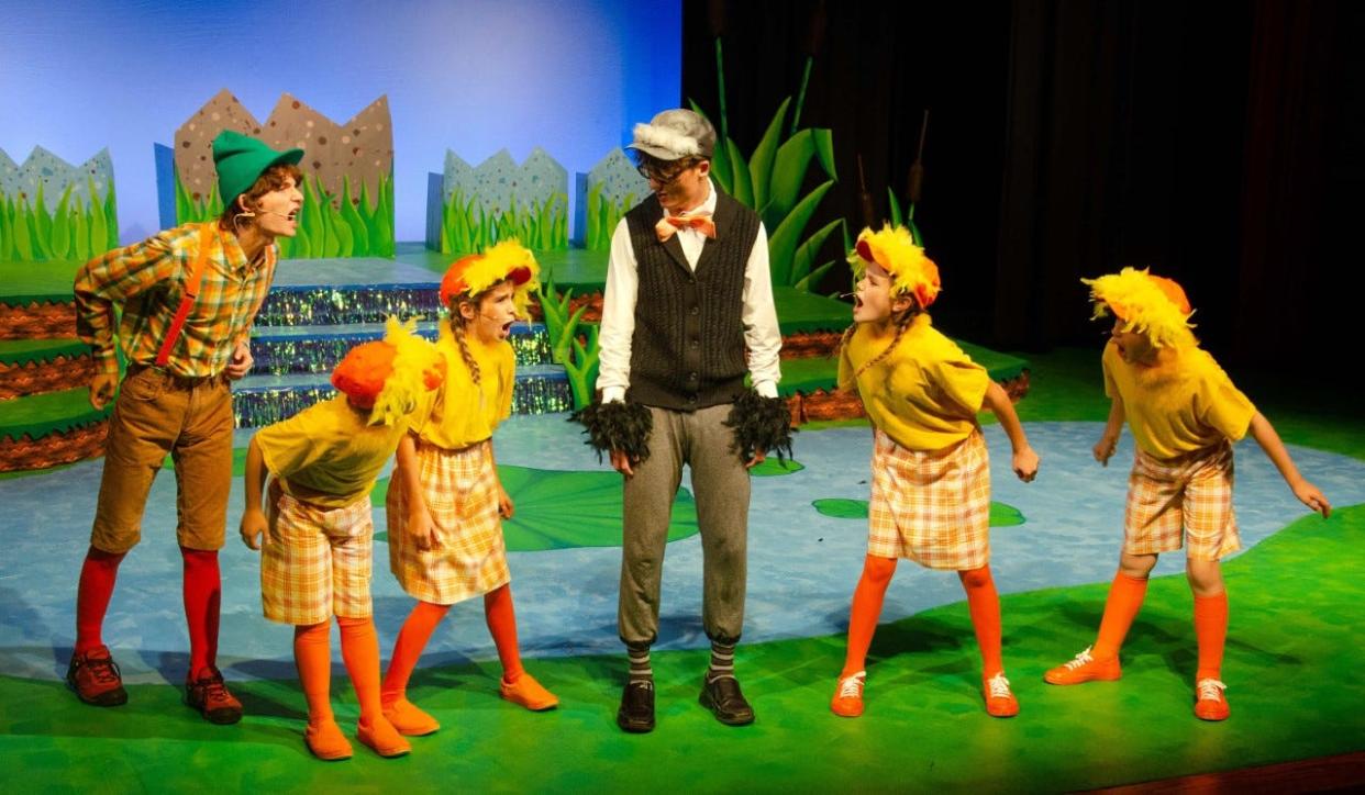 Ugly, center, played by Robby Ritchie, looks on as Dakota Albertoni, left, as Drake, and the ducklings (Andrew Horning as Billy; Annalise Guappone as Fluff; Corie Horning as Downy; and Dominic Falconer as Beaky) perform "Look at Him,' which makes fun of Ugly for being different. The scene is part of Carnation City Players' upcoming "Honk Jr."