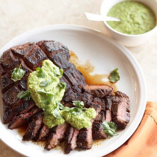 A zesty rub and spicy pesto topping adds pizzazz to simple grilled steak.