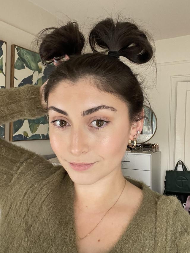 Image of High pigtails with a messy bun hairstyle