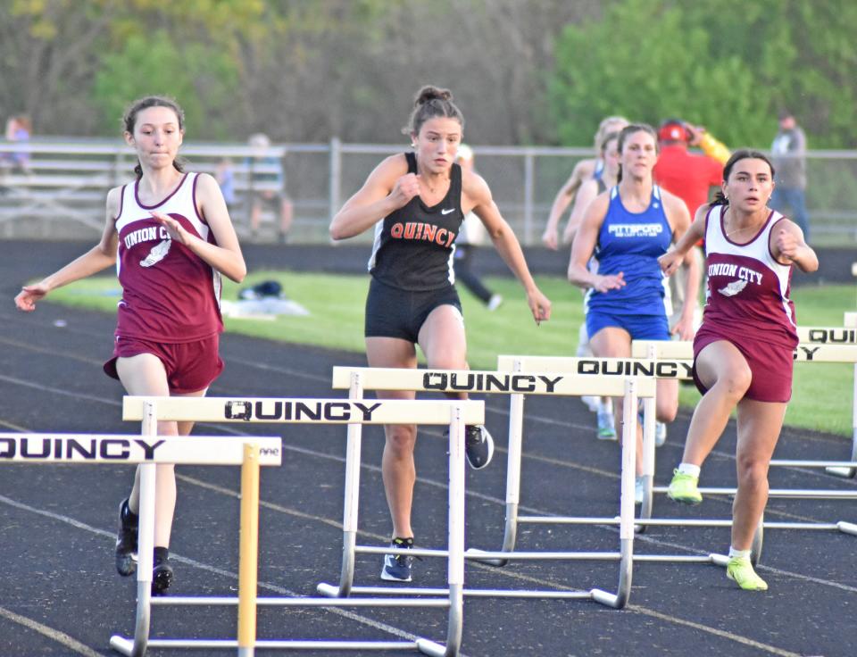 Union City's Nevada Gillons (far right) and teammate Kylie Creech (far left) face off with Quincy's Brookelyn Parker (center) Friday at the Oriole Classic