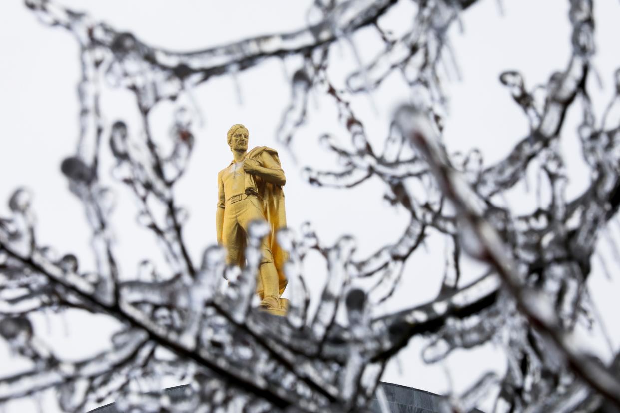 Icicles coat trees surrounding the Oregon State Capitol on Feb. 13, 2021 during storm that caused extensive damage and power outages across the city and region.