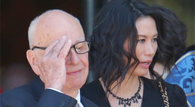 Rupert Murdoch and his wife Wendi Deng Murdoch leave after attending the Dame Elisabeth Murdoch public memorial at St Paul's Cathedral in Melbourne. Photo: Getty.