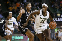 Baylor center Kalani Brown (21) works around Connecticut forward Napheesa Collier during the second half of an NCAA college basketball game Thursday, Jan. 3, 2019, in Waco, Texas. (AP Photo/Ray Carlin)