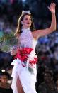 <p>Deidre Downs from Alabama added a little extra flair to her halter gown with a big bow. </p>