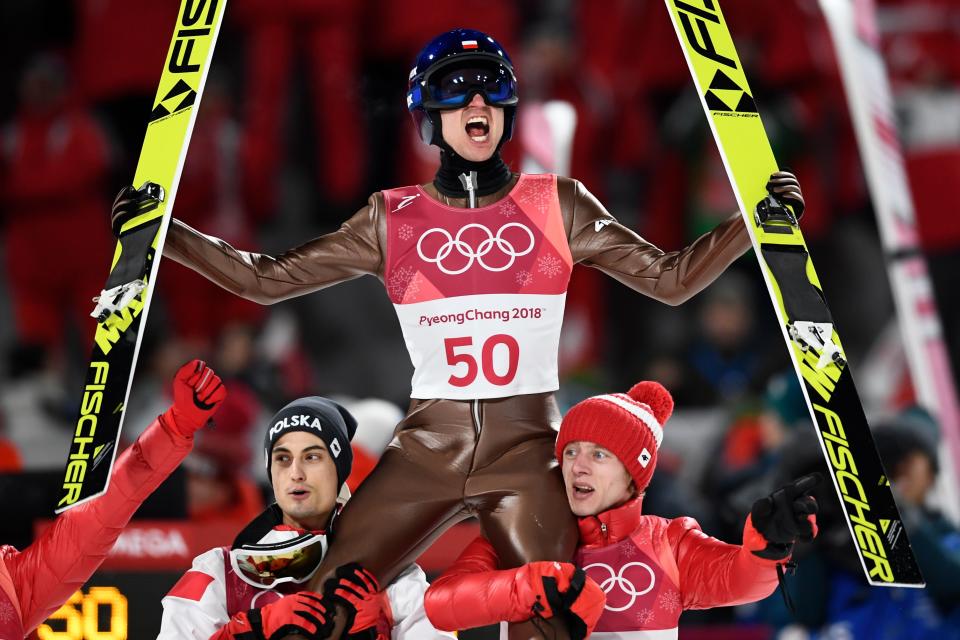 <p>Poland’s Kamil Stoch celebrates winning the men’s large hill individual ski jumping event during the Pyeongchang 2018 Winter Olympic Games on February 17, 2018, in Pyeongchang. / AFP PHOTO / Jonathan NACKSTRAND </p>