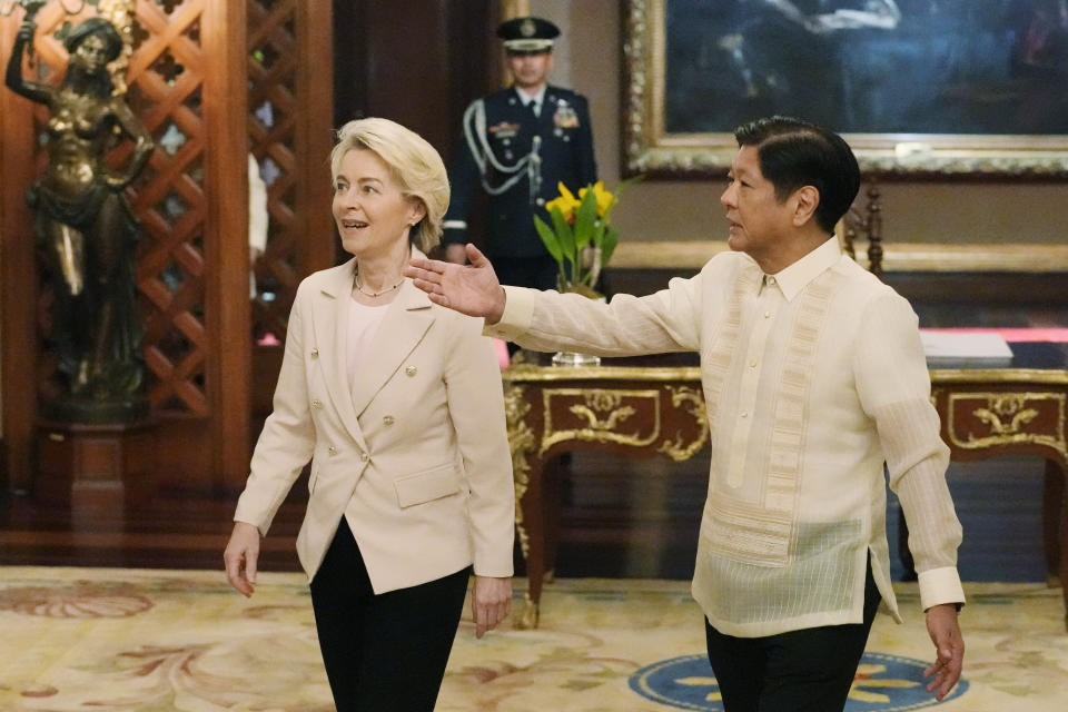 Philippine President Ferdinand Marcos Jr., right, gestures beside European Commission President Ursula von der Leyen during her visit at the Malacanang Presidential Palace in Manila, Philippines, Monday, July 31, 2023. (AP Photo/Aaron Favila, Pool)