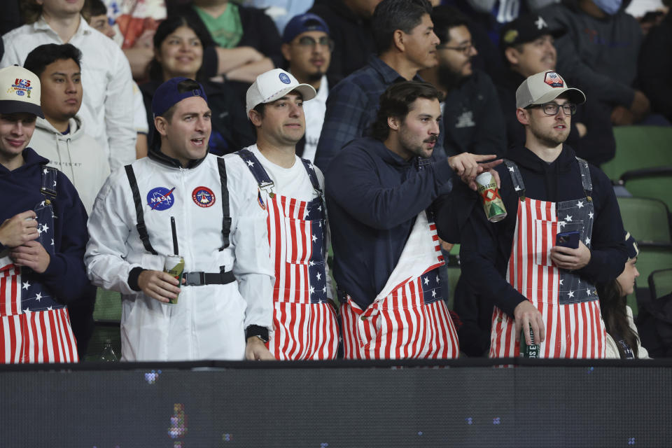 Fans watch as the United States plays against Trinidad and Tobago during the first half of the first leg of a CONCACAF Nations League soccer quarterfinal Thursday, Nov. 16, 2023, in Austin, Texas. (AP Photo/Stephen Spillman)