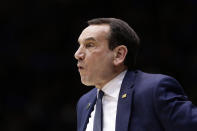 Duke coach Mike Krzyzewski directs his team during the first half of an NCAA college basketball game against Louisville in Durham, N.C., Saturday, Jan. 18, 2020. (AP Photo/Gerry Broome)