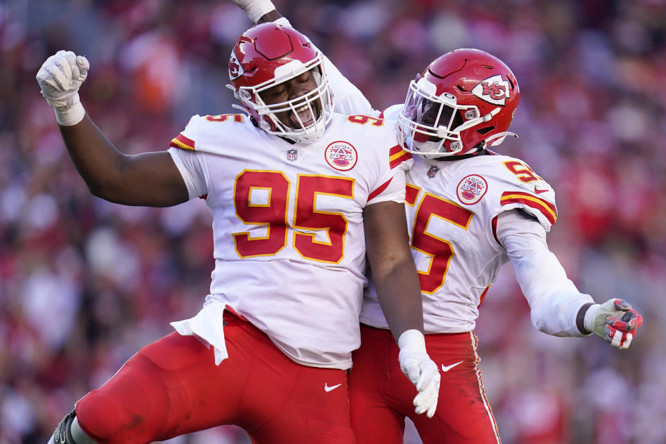 Kansas City Chiefs defensive tackle Chris Jones (95) celebrates defensive end Frank Clark during the second half of an NFL football game against the San Francisco 49ers in Santa Clara, Calif., Sunday, Oct. 23, 2022. (AP Photo/Godofredo A. Vásquez)