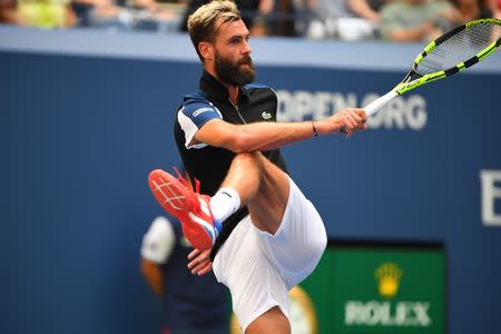 Aug 30, 2018; New York, NY, USA; Benoit Paire of France kicks a ball in frustration while playing Roger Federer of Switzerland in a second round match on day four of the 2018 U.S. Open tennis tournament at USTA Billie Jean King National Tennis Center. Mandatory Credit: Robert Deutsch-USA TODAY Sports