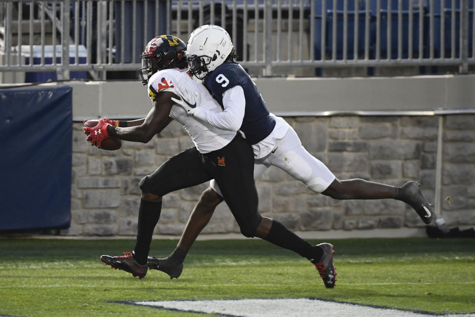 Maryland wide receiver Dontay Demus Jr. (7) catches a second-quarter touchdown pass in front of Penn State cornerback Joey Porter Jr. (9) during an NCAA college football game in State College, Pa., Saturday, Nov. 7, 2020. (AP Photo/Barry Reeger)