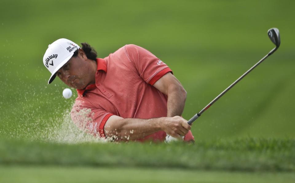 Pat Perez shoots the bunker on the sixth hole of the South Course at Torrey Pines during the final round of the Farmers Insurance Open golf tournament Sunday, Jan. 26, 2014, in San Diego. (AP Photo/Lenny Ignelzi)