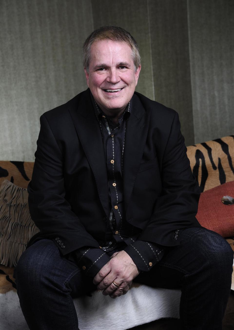 This Saturday, July 27, 2013 photo shows Paul Franklin posing at the Grand Ole Opry in Nashville, Tenn. Franklin and Vince Gill released their latest album "Bakersfield," on July 30. (Photo by Donn Jones/Invision/AP)