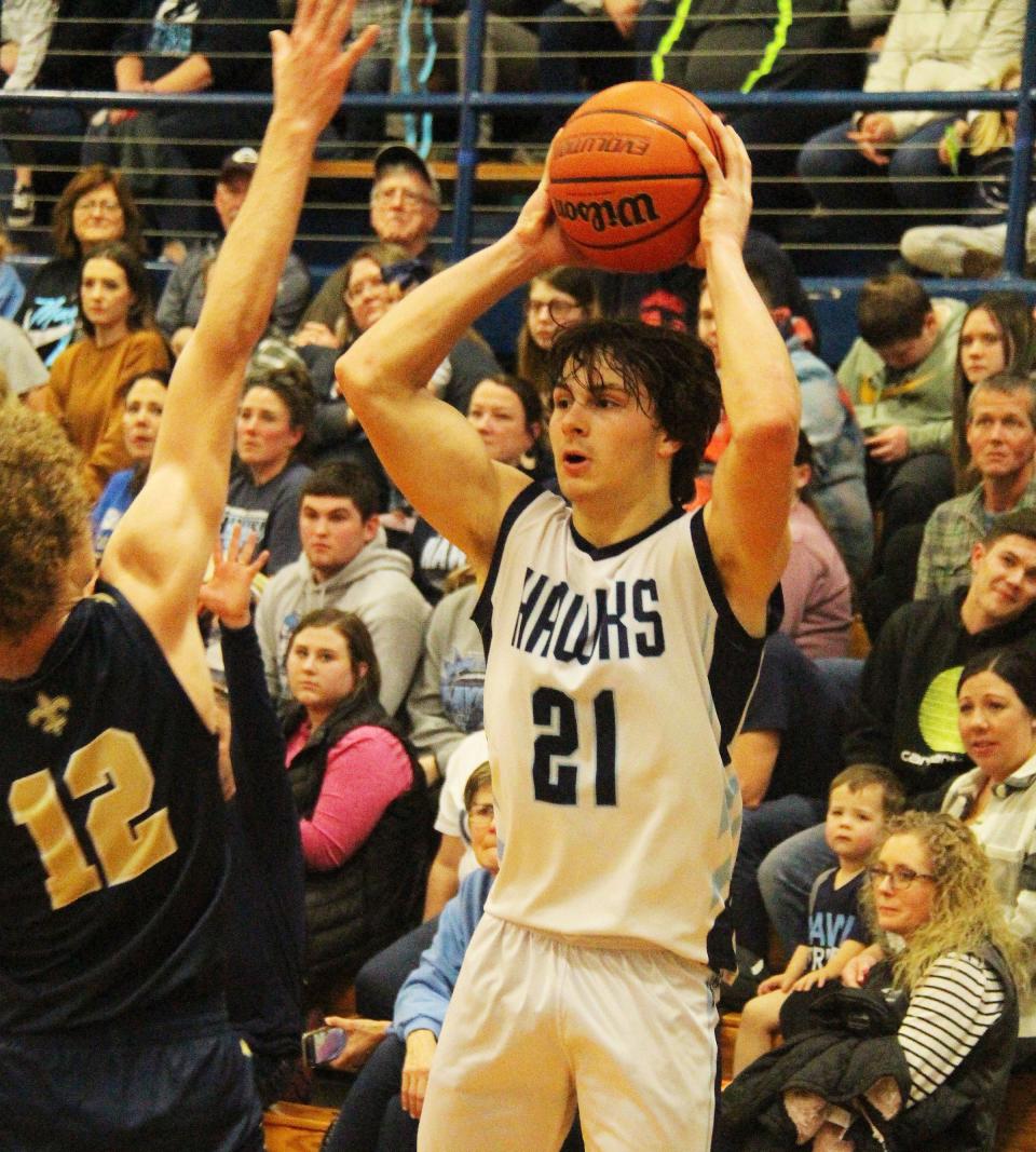 Prairie Central's Drew Fehr looks for an open teammate Tuesday against Central Catholic.