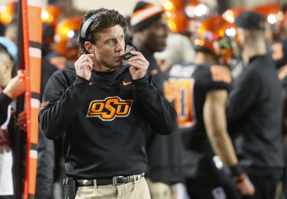 Oklahoma State was the only team to drop out of the top 10 of the AP Poll. (AP Photo/Sue Ogrocki)