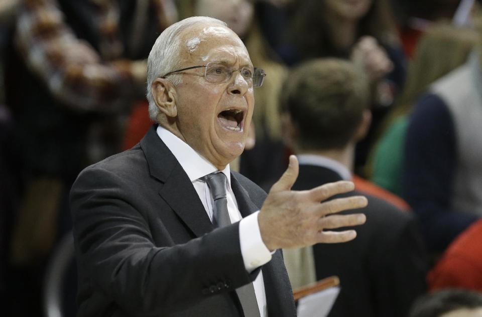 SMU coach Larry Brown yells from the sideline during the first half of an NCAA college basketball game against Cincinnati on Saturday, Feb. 8, 2014, in Dallas. (AP Photo/LM Otero) vcb