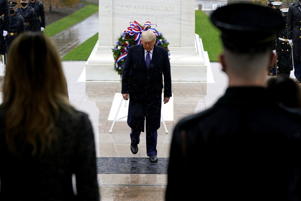 President Donald Trump participates in a Veterans Day wreath laying ceremony at the Tomb of the Unknown Soldier at Arlington National Cemetery in Arlington, Va., Wednesday, Nov. 11, 2020. (AP Photo/Patrick Semansky)