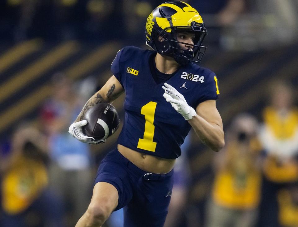 Jan 8, 2024; Houston, TX, USA; Michigan Wolverines wide receiver Roman Wilson (1) against the Washington Huskies during the 2024 College Football Playoff national championship game at NRG Stadium. Mandatory Credit: Mark J. Rebilas-USA TODAY Sports