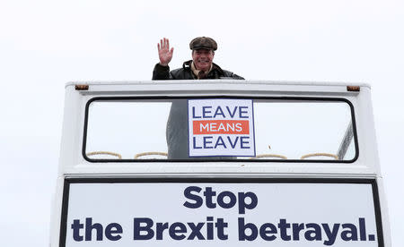 FILE PHOTO: Brexit campaigner Nigel Farage gestures during 'Brexit Betrayal' march from Sunderland to London, in Sunderland, Britain March 16, 2019. REUTERS/Scott Heppell