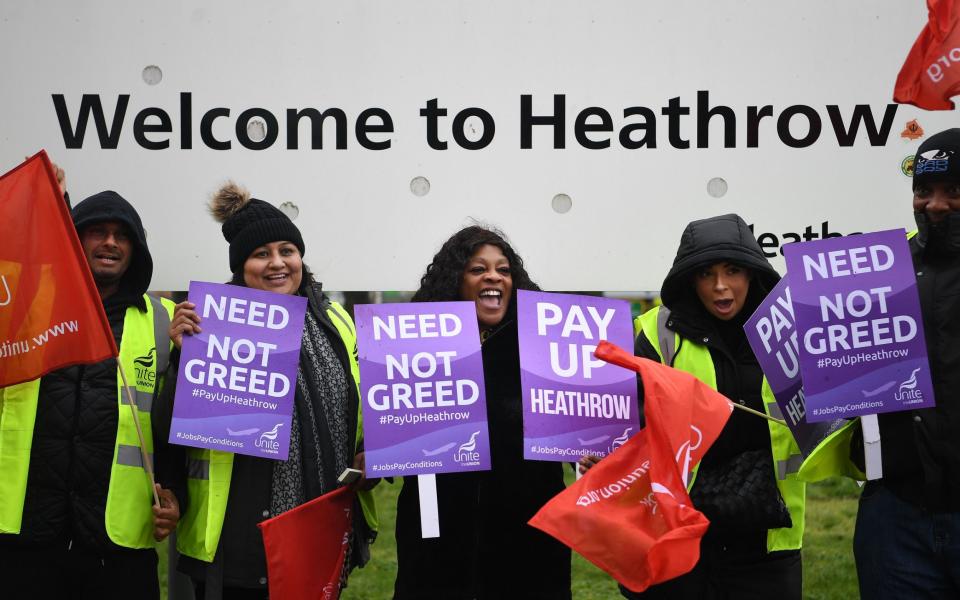 Heathrow security staff strike outside Heathrow Airport in March - ANDY RAIN/EPA-EFE/Shutterstock