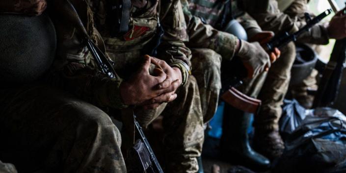 Ukrainian servicemen ride in a military truck near the frontline city of Bakhmut, Donetsk region on April 30, 2023, amid the Russian invasion of Ukraine.