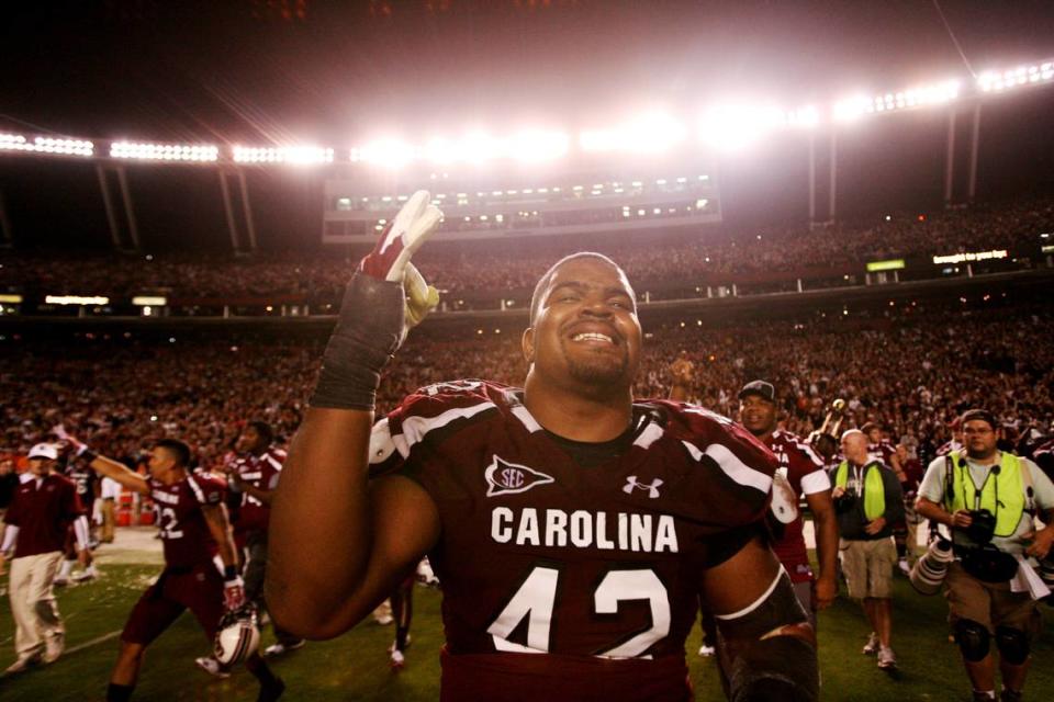 South Carolina defensive tackle Travian Robertson (42) celebrates the Gamecocks win over Clemson, at Williams-Brice Stadium, Saturday, November 26, 2011.