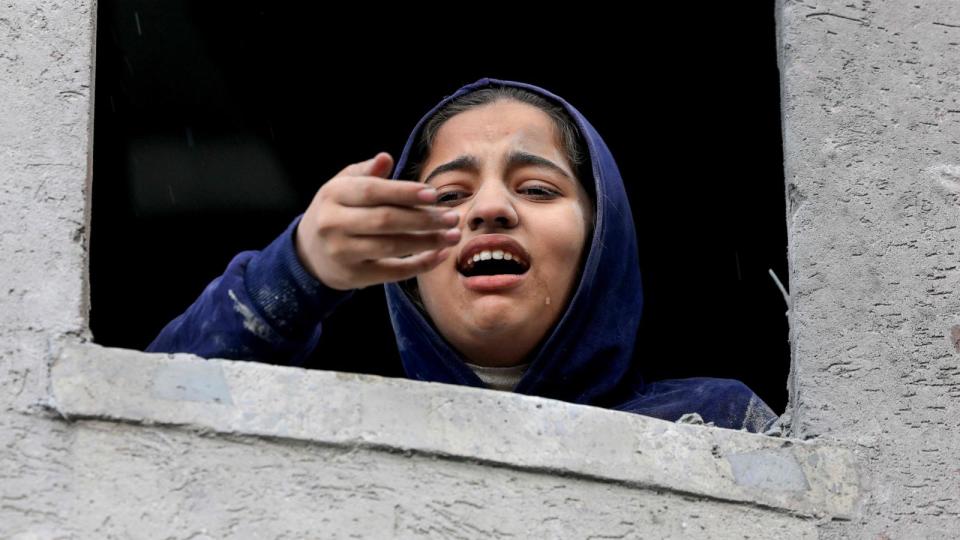 PHOTO: A Palestinian girl cries following an Israeli strike on Rafah in the southern Gaza Strip, Nov. 20, 2023. (Mahmud Hams/AFP via Getty Images)