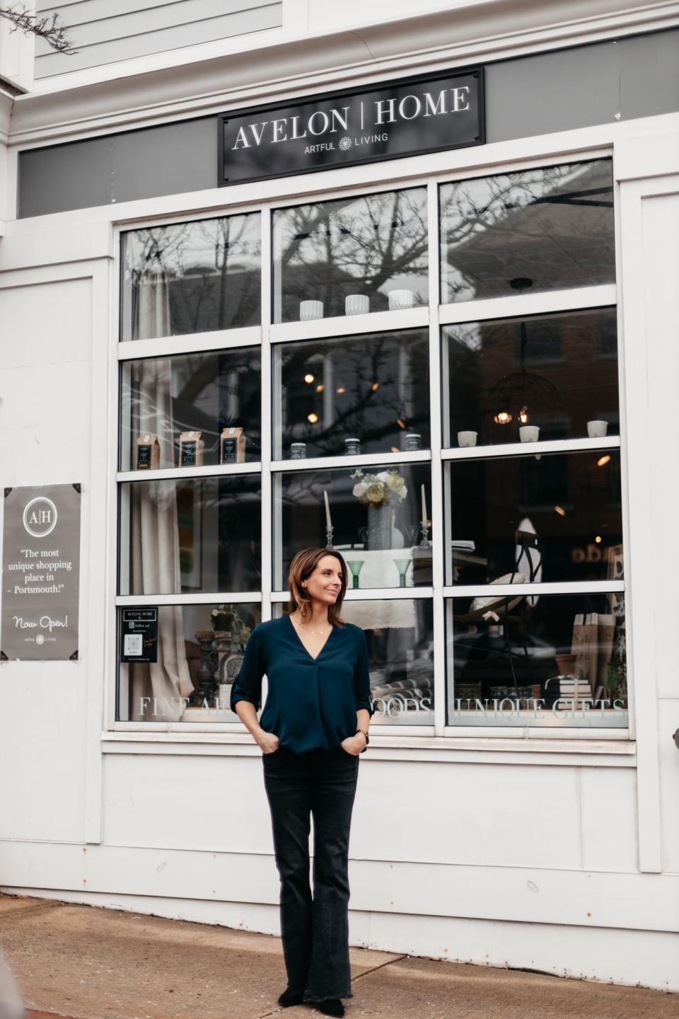 Avelon owner, Taylor Amaio Fletcher  stands outside of her store located in downtown Portsmouth, N.H.