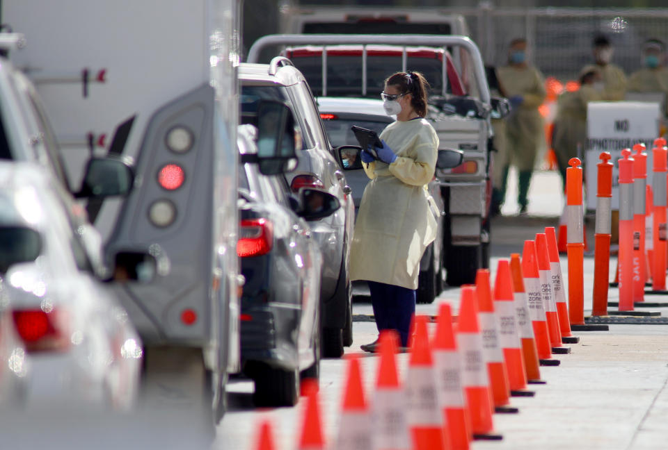People waiting in their cars at the Covid-19 testing facility. Source: AAP