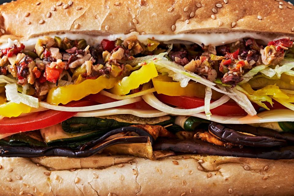 vegetarian italian sub stuffed with eggplant, zucchini and olive salad