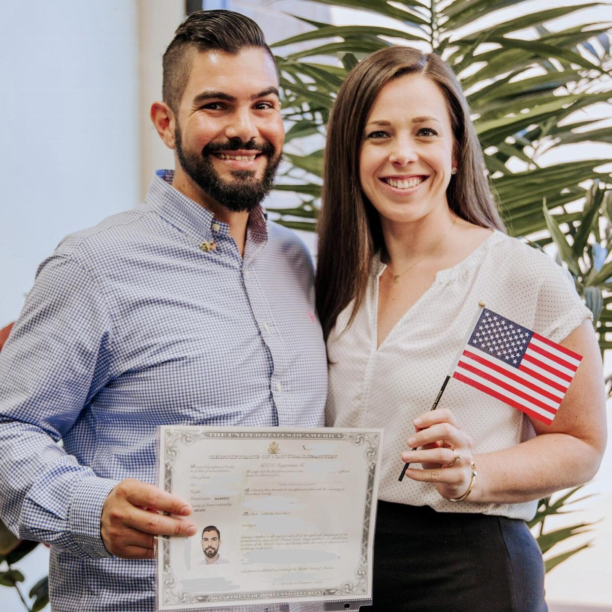 Tiago and the author on the day he was naturalized as a U.S. citizen. (Photo: Photo Courtesy Of Kelli Ferguson)