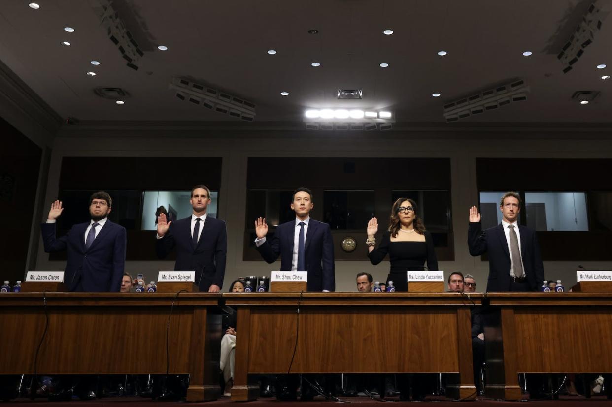 The CEOs of Discord, Snap, TikTok, X and Meta prepare to testify before the Senate Judiciary Committee on Jan. 31, 2024. <a href="https://www.gettyimages.com/detail/news-photo/jason-citron-ceo-of-discord-evan-spiegel-ceo-of-snap-shou-news-photo/1975356383" rel="nofollow noopener" target="_blank" data-ylk="slk:Alex Wong/Getty Images;elm:context_link;itc:0;sec:content-canvas" class="link ">Alex Wong/Getty Images</a>