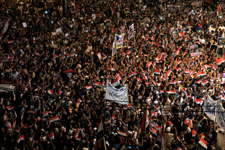 Supporters of Iraqi Shi'ite cleric Moqtada al-Sadr gather during a protest calling for neutrality during the ongoing tensions between neighbouring Iran and the USA, in Baghdad, Iraq May 24, 2019. REUTERS/Alaa Al-Marjani