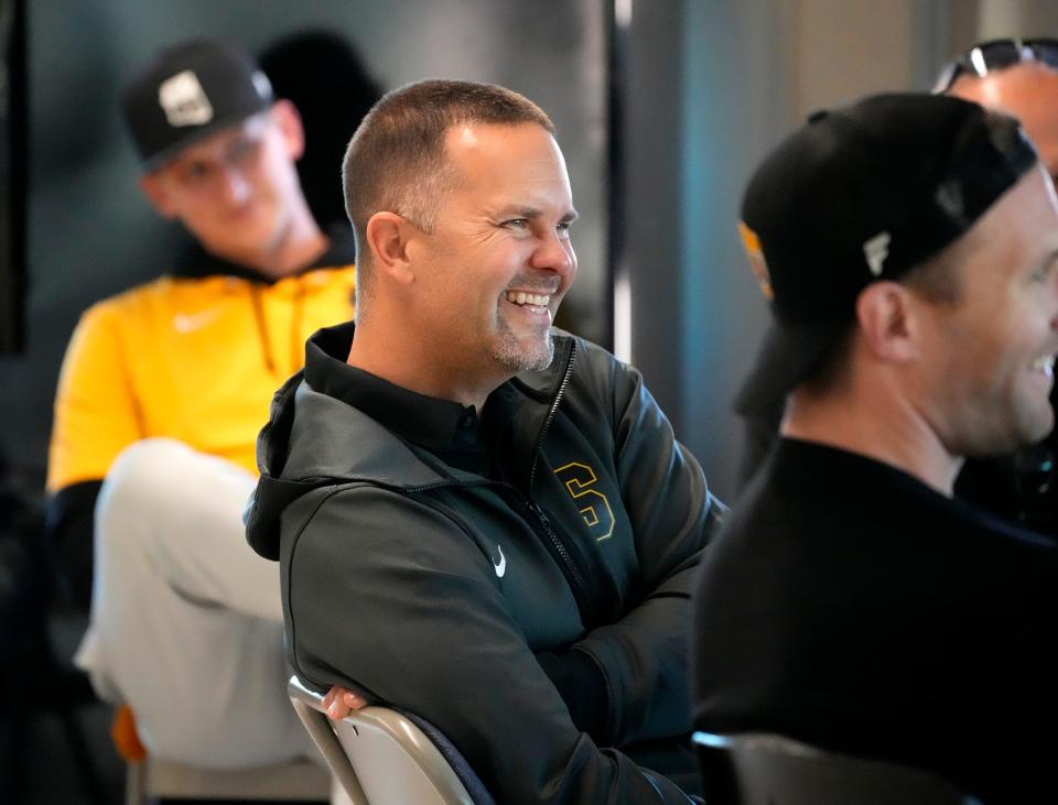 Jan 18, 2023; Scottsdale, AZ, U.S.;  Zak Hill, former Arizona State offensive coordinator, meets with the coaching staff before a press conference announcing him as the new Saguaro High School head football coach. Mandatory Credit: Cheryl Evans-Chow-Arizona Republic