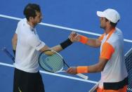 Tennis - Australian Open - Melbourne Park, Melbourne, Australia - 22/1/17 Germany's Mischa Zverev shakes hands after winning his Men's singles fourth round match against Britain's Andy Murray. REUTERS/Jason Reed