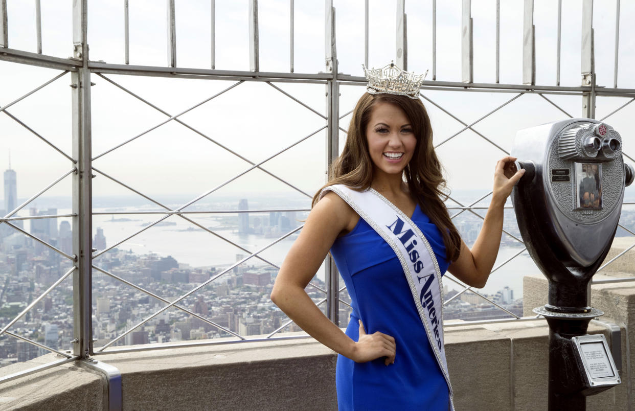 FILE - Miss America 2018 Cara Mund poses for photographers on the 86th Floor Observation Deck of the Empire State Building in New York, Sept. 12, 2017. Mund, the former Miss America who gained attention by criticizing the organization near the end of her reign in 2018, is planning to run for Congress in North Dakota as an independent, she announced Saturday, Aug. 6, 2022. (AP Photo/Mary Altaffer, File)