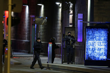 French special police forces secure an area during a police operation in the Meinau district after the deadly shooting in Strasbourg, France, December 13, 2018. REUTERS/Vincent Kessler