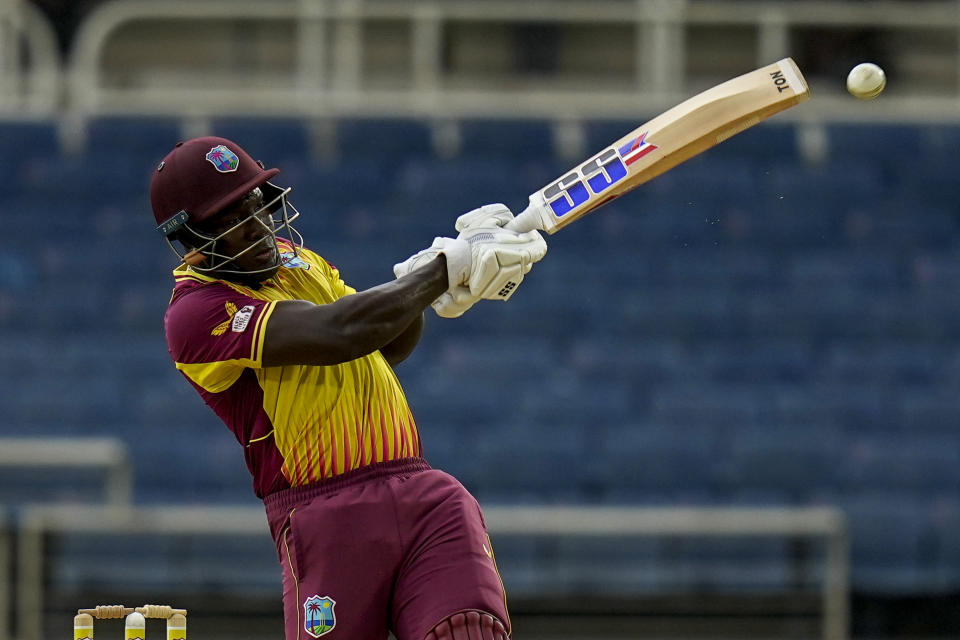 West Indies' Rovman Powell plays a shot against New Zealand during the second T20 cricket match at Sabina Park in Kingston, Jamaica, Friday, Aug. 12, 2022. (AP Photo/Ramon Espinosa)