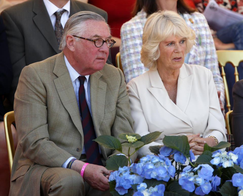 BADMINTON, UNITED KINGDOM - MAY 06: (EMBARGOED FOR PUBLICATION IN UK NEWSPAPERS UNTIL 48 HOURS AFTER CREATE DATE AND TIME) Lord Samuel Vestey and Camilla, Duchess of Cornwall watch the show jumping phase of the Badminton Horse Trials on May 6, 2013 in Badminton, England. (Photo by Max Mumby/Indigo/Getty Images)